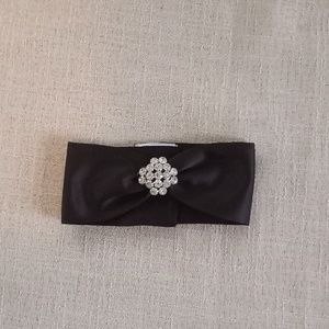 Candle Wrap. Black satin with rhinestone deco.